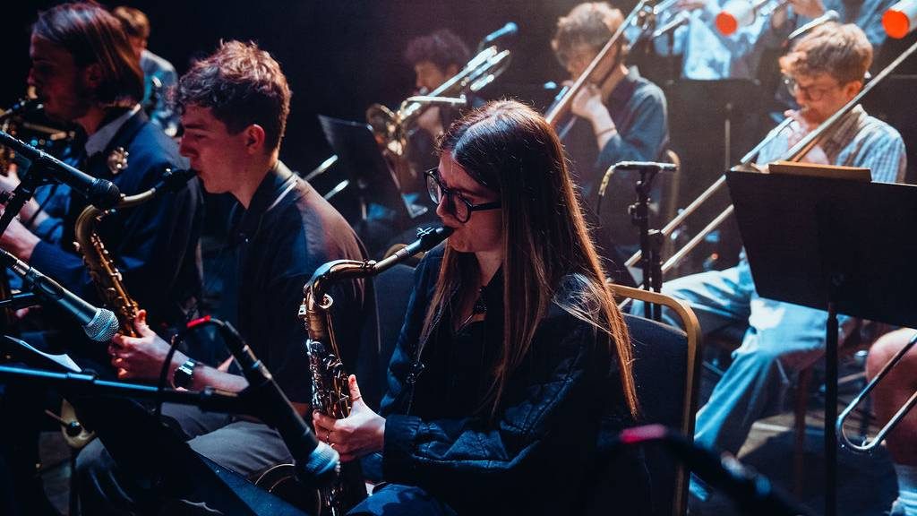A jazz band performing on stage.